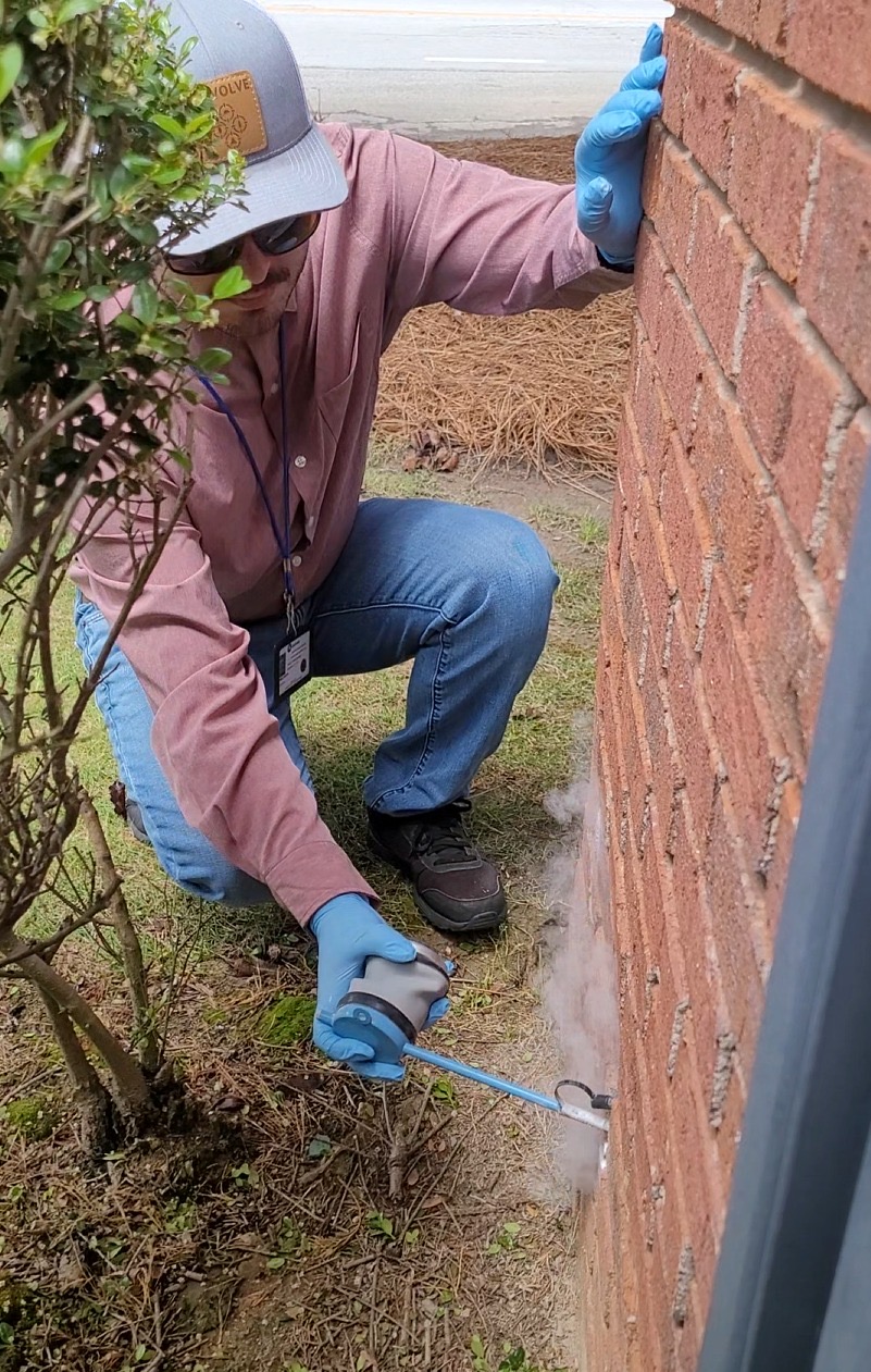 Nuvolve technician treating the foundation of a home